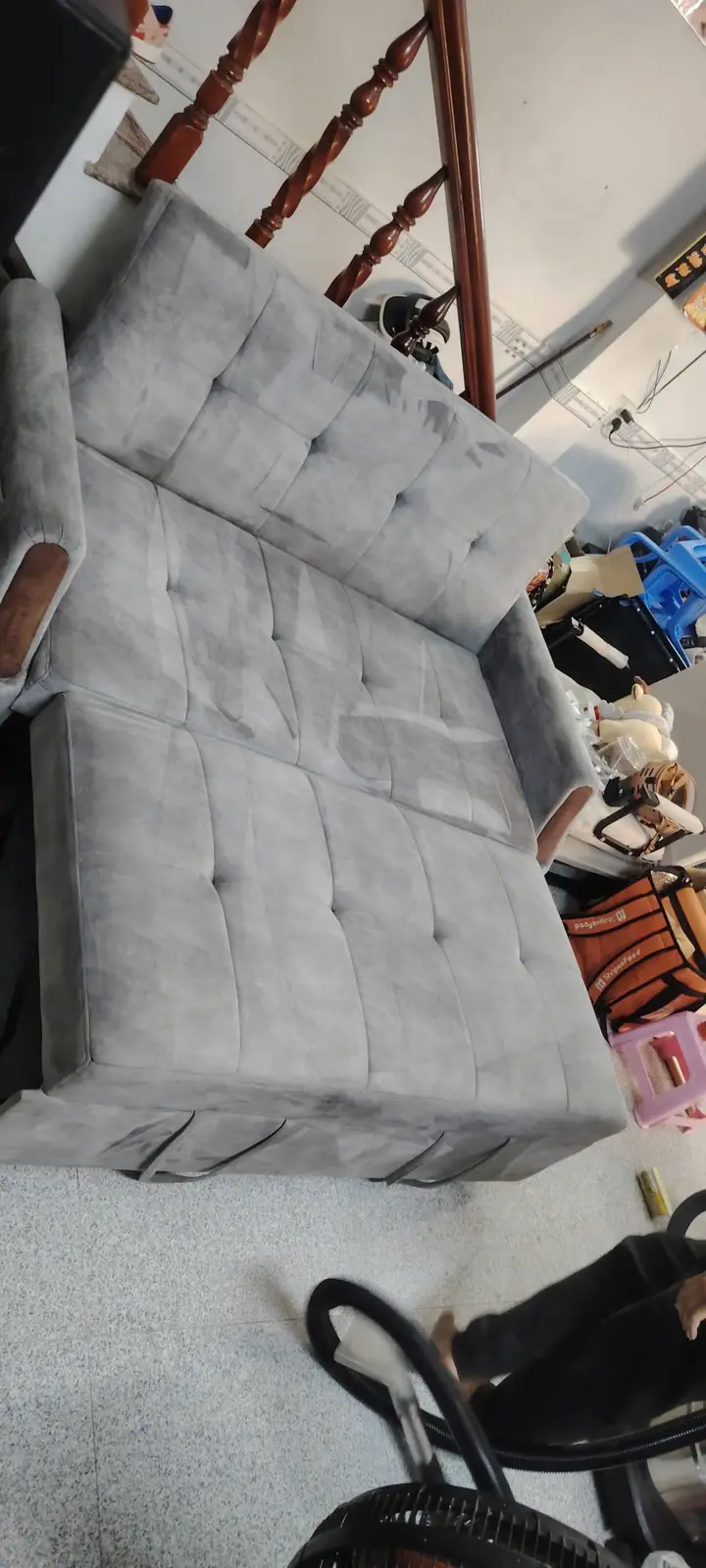 Sofa góc L nỉ xám sau khi vệ sinh bởi S.T Clean